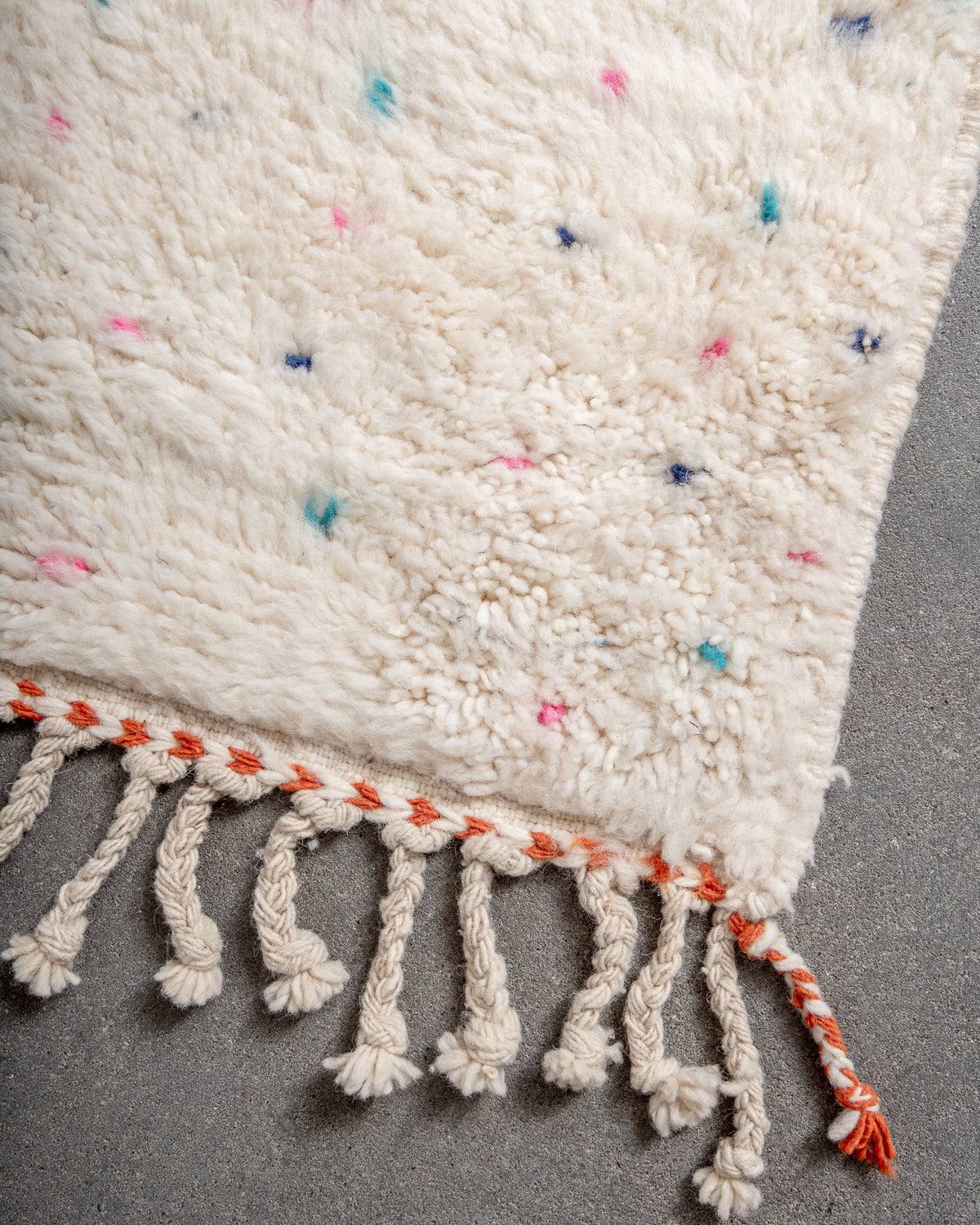Modern, designer, handcrafted Berber rug from Morocco. Beniourain carpet with beautiful colours and patterns and fluffy wool texture.